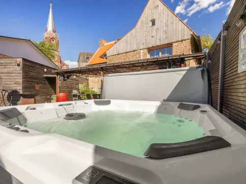 Historisch pand met bar, sauna en bubbelbad