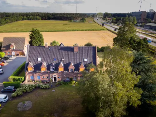 Groepshuis in België met weelderige tuin en terras